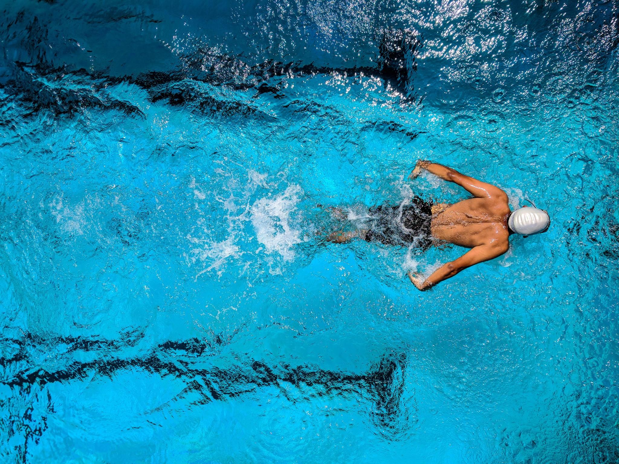 person swimming pool 